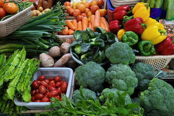 Fresh vegetables and fruits for sale in Asian farmer market stall