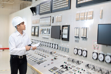 Asian male engineers play a key role in the design and implementation of energy solutions such as microgrids and power generation systems. This increases the flexibility and reliability of power.