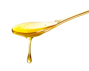 Honey dripping from spoon