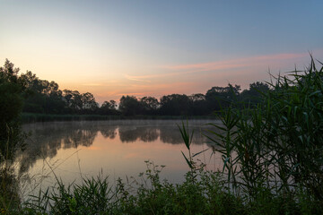 Colors of the sunrise over the pond 