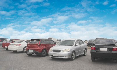 Car in stock for sale inventory. Car park outdoor in a row, automobile transportation dealer business concept