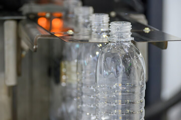 The drinking water bottle manufacturing process by blow mold machine.