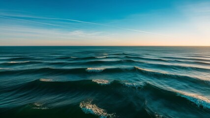 Obraz premium bird's eye view shot of the ocean, on a clear day 