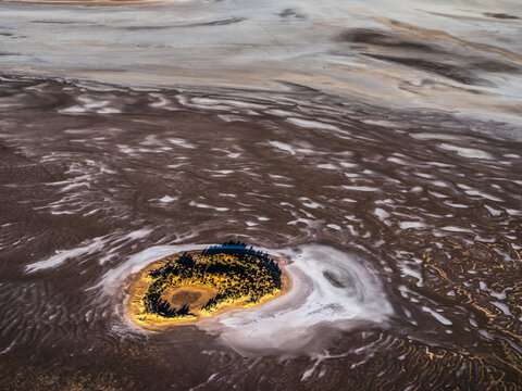 Aerial view of Lake Amadeus, salt lake, desert island, and unique terrain, Petermann, Northern Territory, Australia.