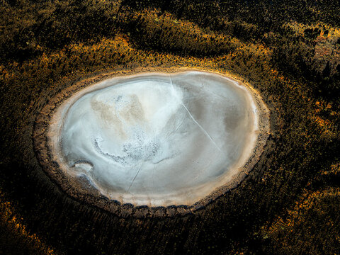 Aerial view of Lake Amadeus, salt lake with beautiful landscape and vegetation, Petermann, Northern Territory, Australia.