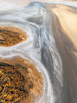 Aerial view of Lake Amadeus, salt lake and desert in arid Northern Territory, Australia.
