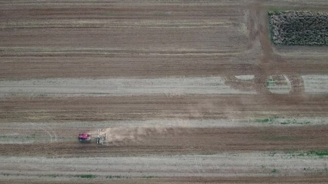 Work in the fields, farmer, tractor, Castelceriolo, Alessandria, Piedmont, Italy, drone
