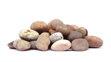 Pebbles piled on white background