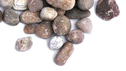 Pebbles piled on white background