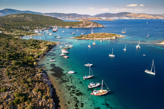 Aerial view of Paradise Cove with boats and sailboats, Aegean Sea, Bodrum, Turkey.