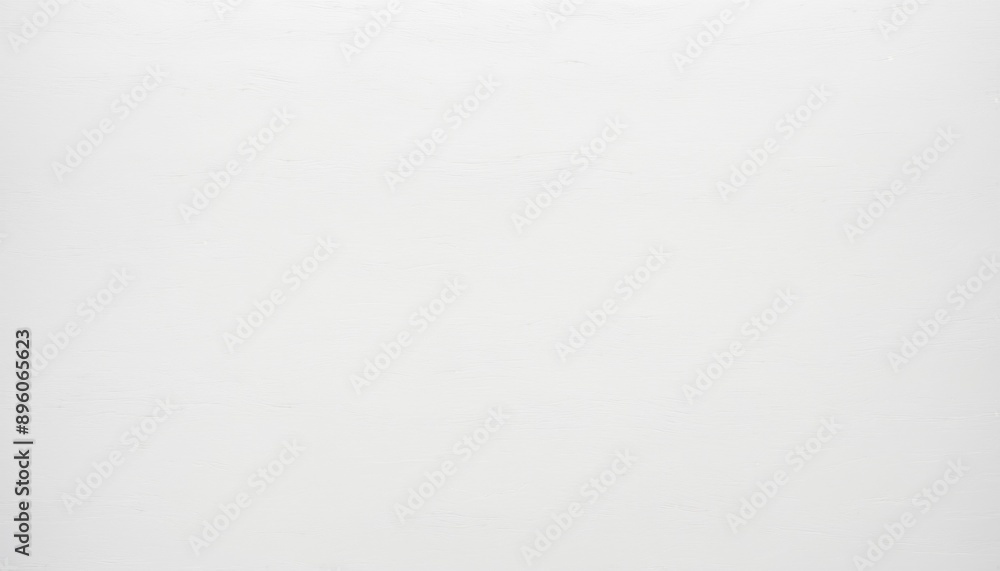 Poster smooth white wall with subtle texture. the wall is predominantly white, with minimal variation in co