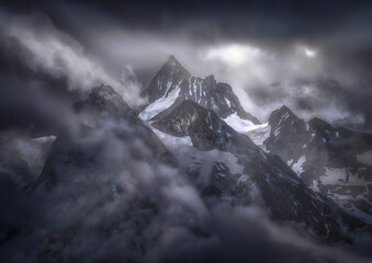 Aerial view of Snowcapped Mountain and Glacier in dramatic Valley of Gods, Alaska, United States.