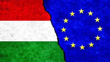 Hungary and European Union (EU) flag together on wall. EU Hungary relations, economy, friendship, conflict, trade concept. EU vs Hungary