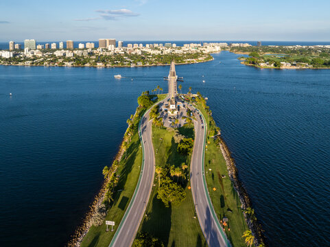 Aerial view of bridge, highway, water, skyline, and buildings over Biscayne Bay, Bay Harbor Islands, Florida, United States.