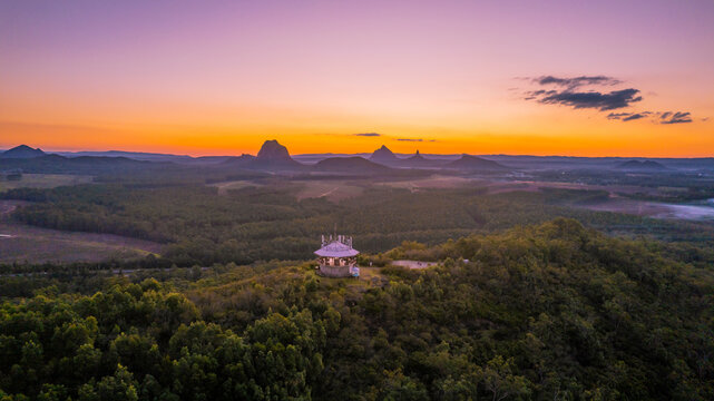 Aerial view of Glass House Mountains Range at twilight, Wild Horse Mountain Lookout, Queensland, Australia.