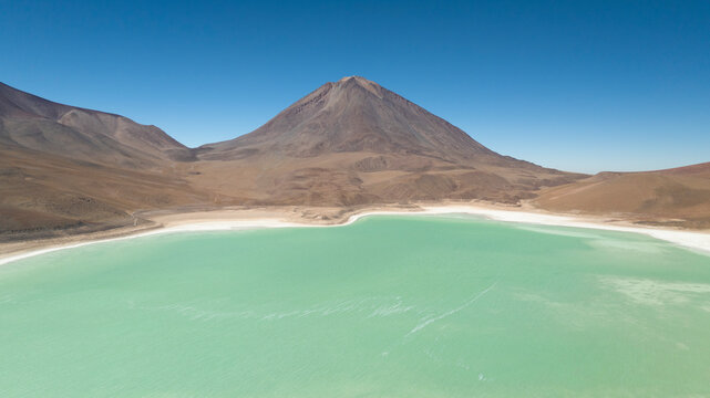 Aerial view of Laguna Blanca desert with majestic mountains and tranquil lake, San Pablo, Potosi, Bolivia.