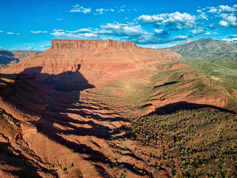 Aerial view of Castleton and Mother Superior rock formations, Moab, Utah, United States.