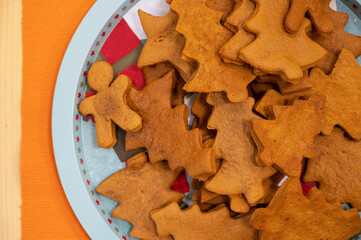 Plate with Christmas cookies on a table