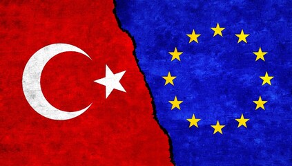 Turkey and European Union (EU) flags together on wall. EU Turkey relations, economy, relationship, trade concept. Turkey vs EU