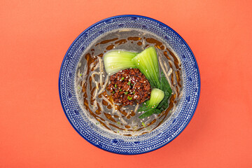 Portion of appetizing japanese tantanmen ramen with bok choy