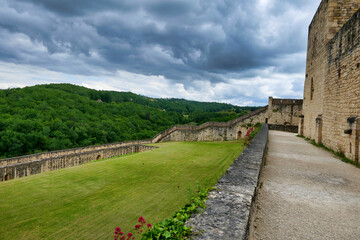 View of the Dordogne landscape as seen from Chateau Beynac et Cazenac under a gloomy sky
