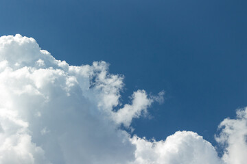 Large white cloud on a bright blue sky