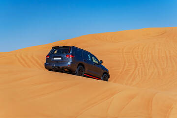 Obraz premium Desert Safari Rub Al Khali desert. Dubai Desert Travel Car Trip
