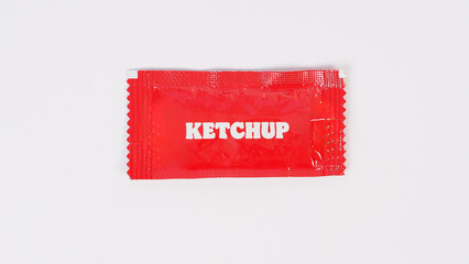Ketchup  in Sachet on white background.
