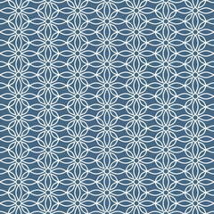 Beautiful seamless floral pattern, with four petal leaf shapes on a denim blue background. Suitable for various design purposes of textiles, tiles, wallpapers, backgrounds, etc.
