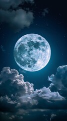 Full moon shining brightly in a dark sky with clouds