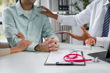 Obraz premium Doctor offers comfort and empathy to patient during medical consultation