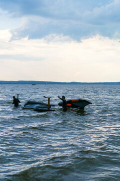 Wingfoil rider riding in the lake.