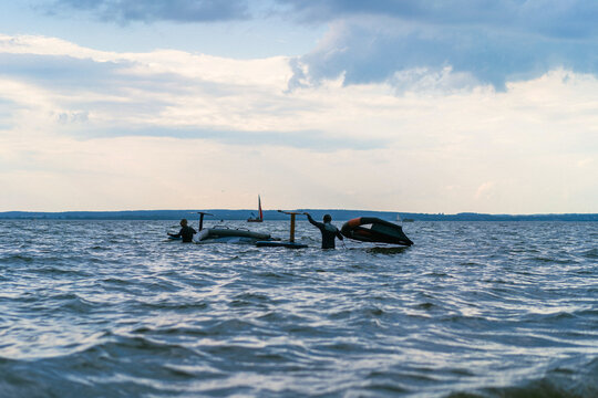Wingfoil rider riding in the lake.