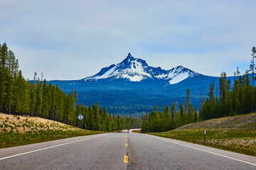 Snow-Capped Mountains and Highway in Crater Lake National Park Perspective