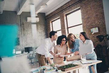 Photo of group business company workers discuss communicate spacious modern loft interior office...