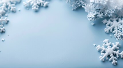 A blue background with snowflakes scattered around it