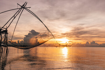 Villager large fish net lifting hut in Songkhla lake, Phatthalung, Thailand.