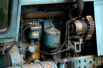 Old, rusty, blue, farm tractor close up