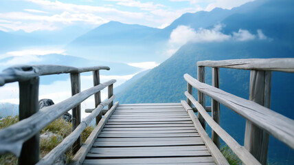 A wooden pathway leading through the mountains with a breathtaking view.