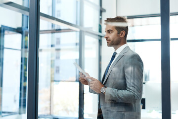 Fototapeta premium Thinking, tablet and vision with business man in corporate office for administration or research. Accounting, finance and trading with confident broker in workplace for stock market investment