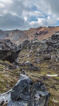 Surreal volcanic landscape of Landmannalaugar Iceland vertical sliding shot