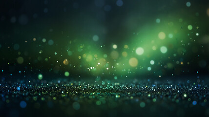 a blurry image of a green and blue background with small stars. Colorful stars background. Green and orange colored stars