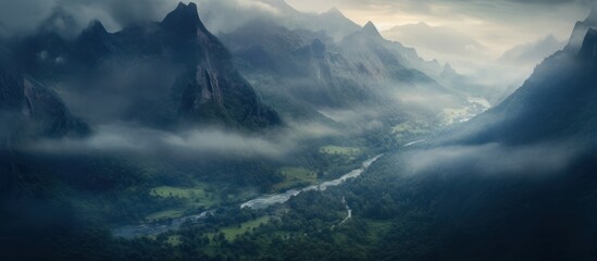 The mountains are visible through the mist with dramatic and beautiful lighting