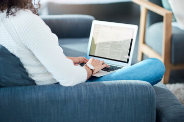 Woman, laptop and screen with writing, proposal and project at home or apartment living room. Lady,...