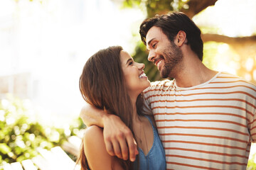 Obraz premium Love, vacation or happy couple hug in park to date, smile or enjoy anniversary together for peace. Outdoor, romantic woman or man in nature for trust or bonding with care, support or special moment