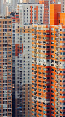 A close-up view of the facades of modern apartment buildings in a bustling city