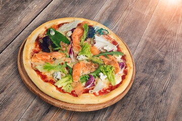 Delicious fresh hot pizza on wooden table