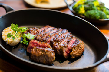 Sliced of grilled steak rib eye medium rare status