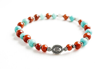 Obraz premium Close up of a bracelet with red and blue beads
