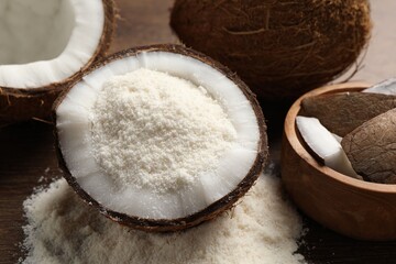 Coconut flour and fresh fruits on wooden table, closeup
